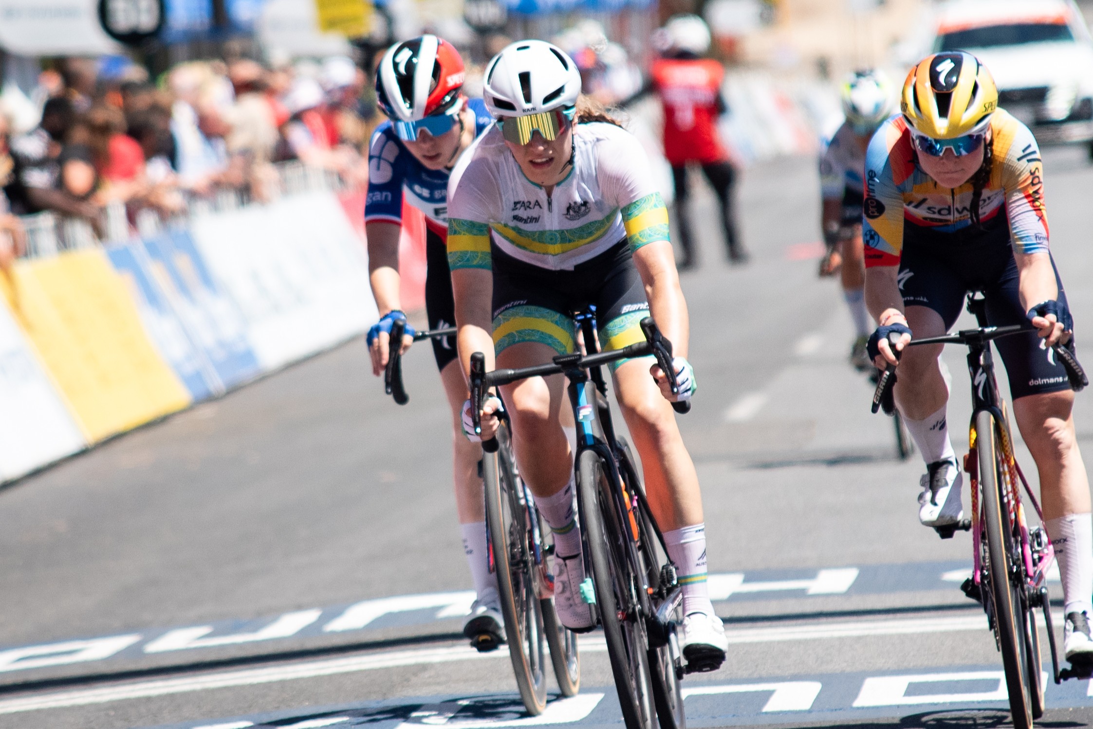 Sophie Edwards finishes a stage at the 2026 Santos Tour Down Under for the ARA Australian Cycling Team